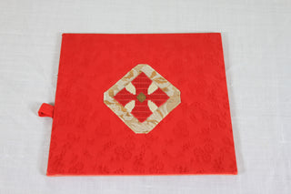 Used Burse with red/gold flower style cross