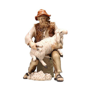 Shepherd Sitting With Sheep - 801082